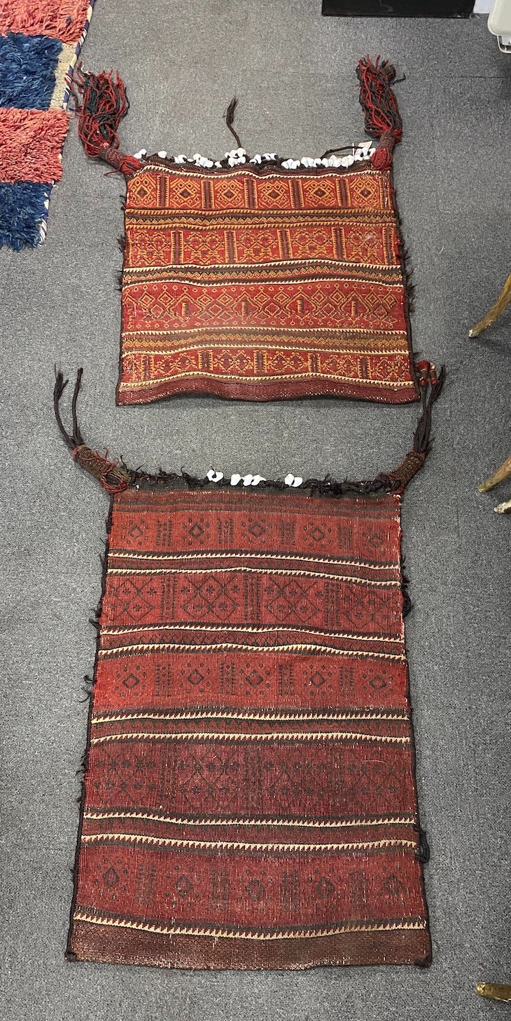 Two Afghan polychrome salt bags, larger 84cm x 48cm.